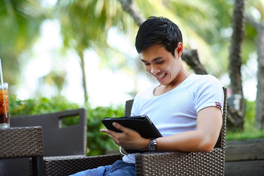 man reading ebook